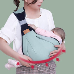 Babytrage als Schulterschlinge